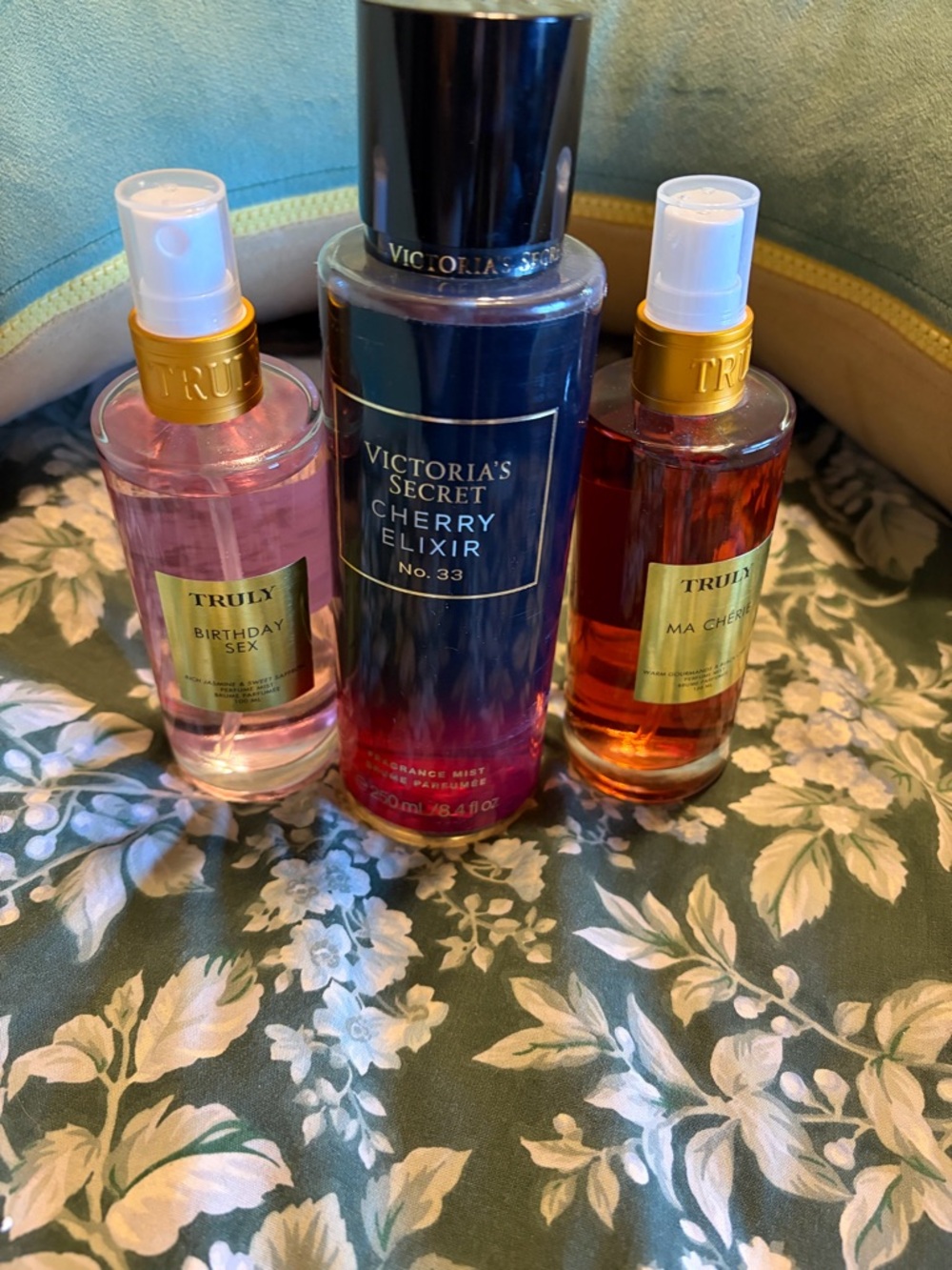 Victoria's Secret Cherry Elixir Fragrance and two Truly fragrances lightly used.